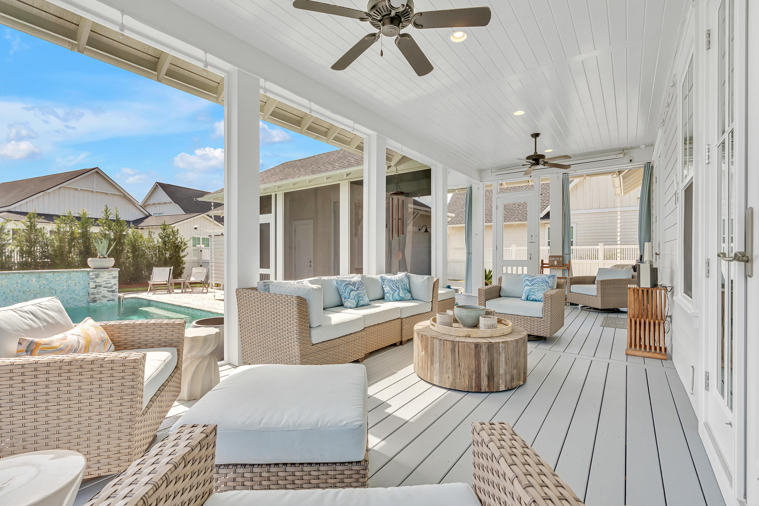 70 Sidecamp Road, Unit LOT 92 Watersound, FL 32461 - Photo 33 of 58 a living room with furniture and a large window