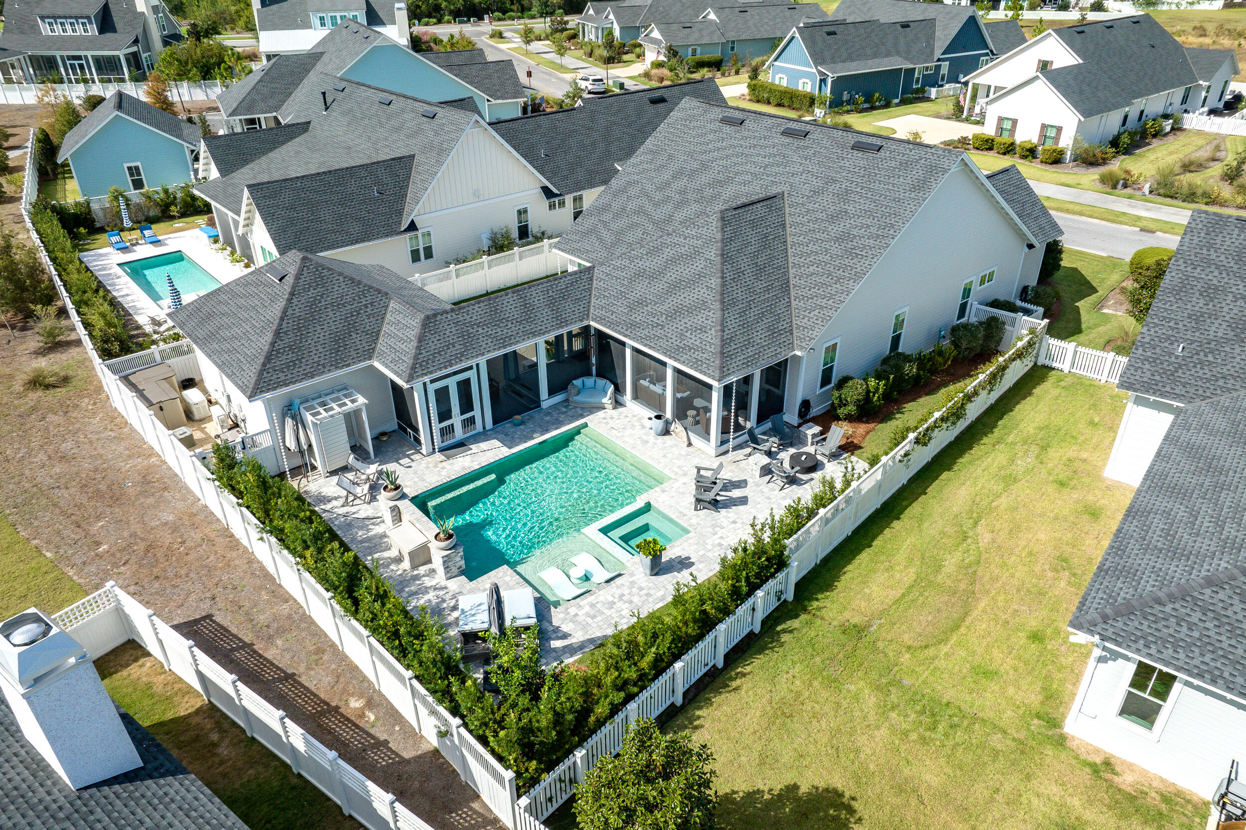 70 Sidecamp Road, Unit LOT 92 Watersound, FL 32461 - Photo 41 of 58 an aerial view of a house with swimming pool