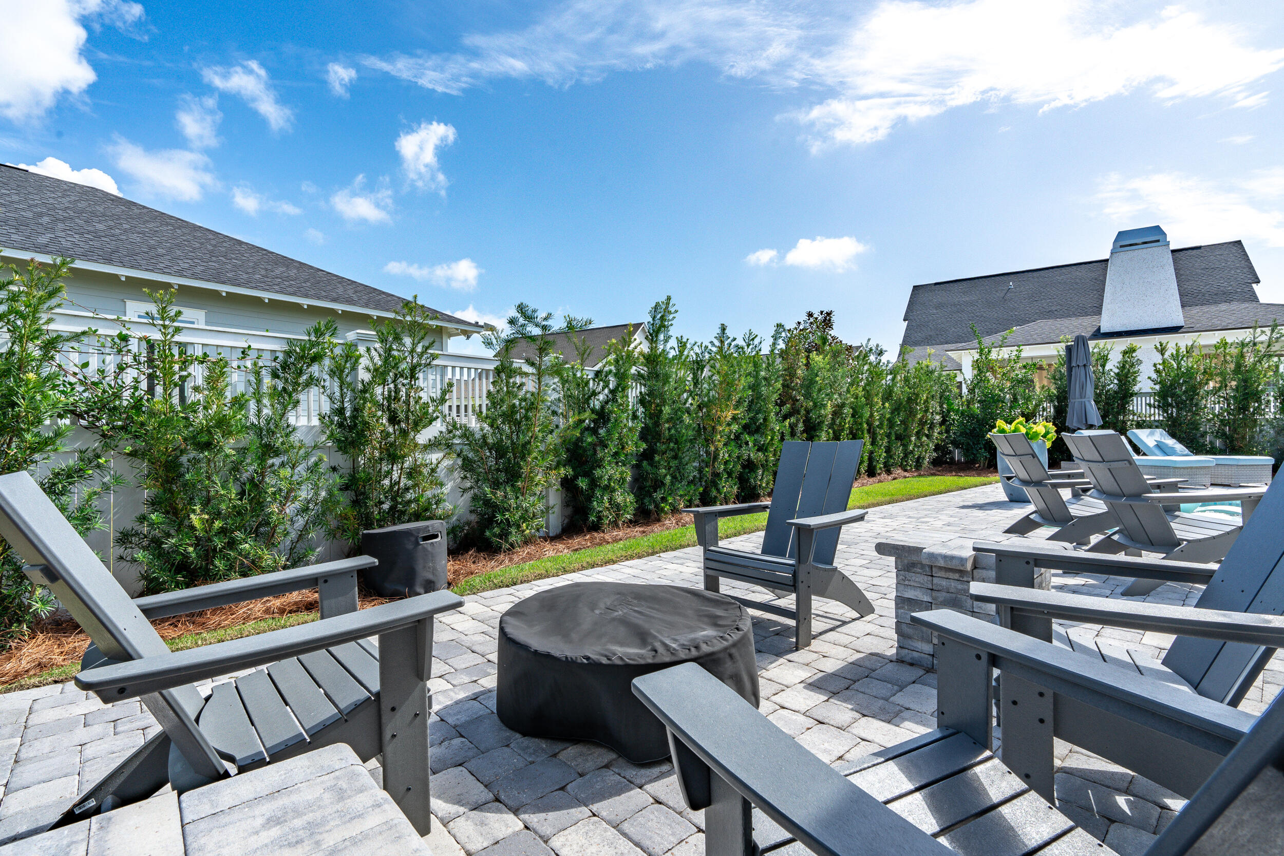 70 Sidecamp Road, Unit LOT 92 Watersound, FL 32461 - Photo 45 of 58 a view of a patio with swimming pool