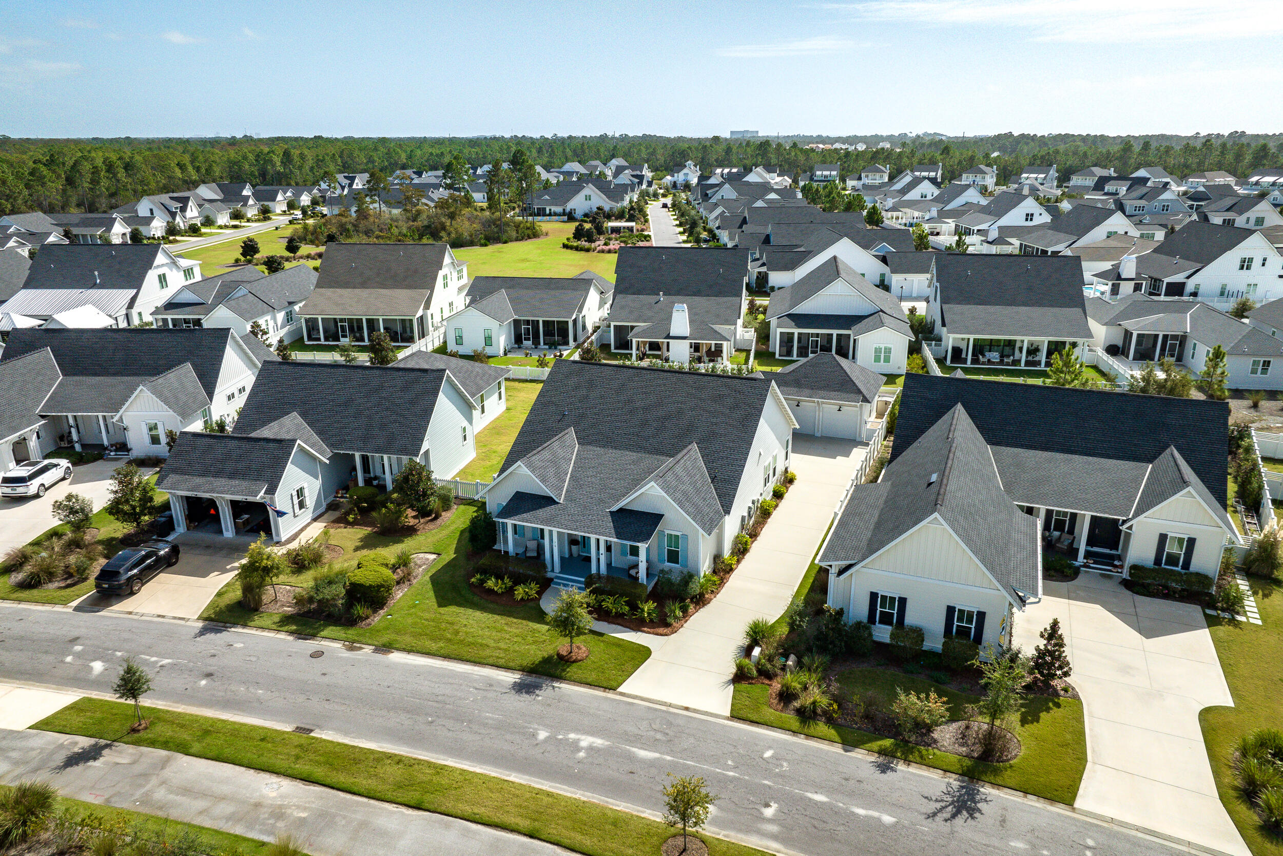 70 Sidecamp Road, Unit LOT 92 Watersound, FL 32461 - Photo 52 of 58 an aerial view of a house with a garden