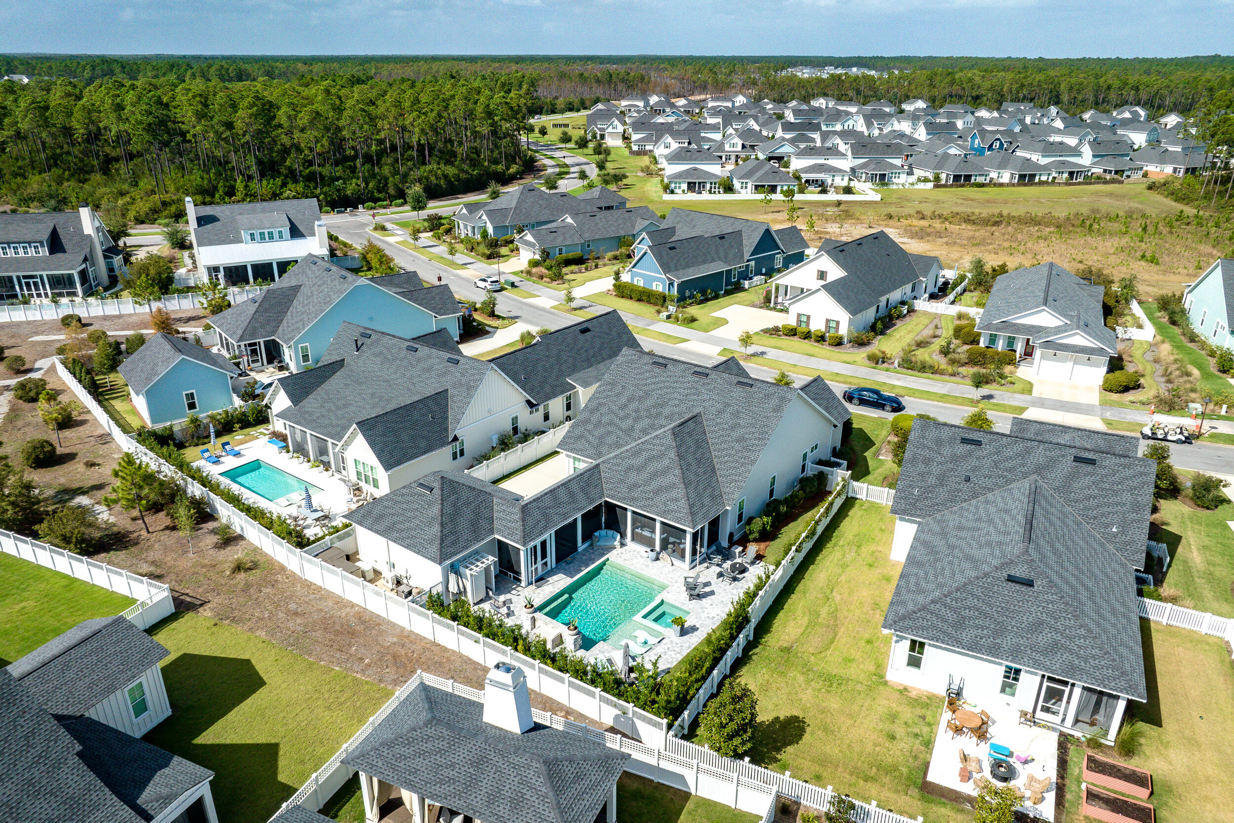 70 Sidecamp Road, Unit LOT 92 Watersound, FL 32461 - Photo 53 of 58 an aerial view of residential houses with outdoor space