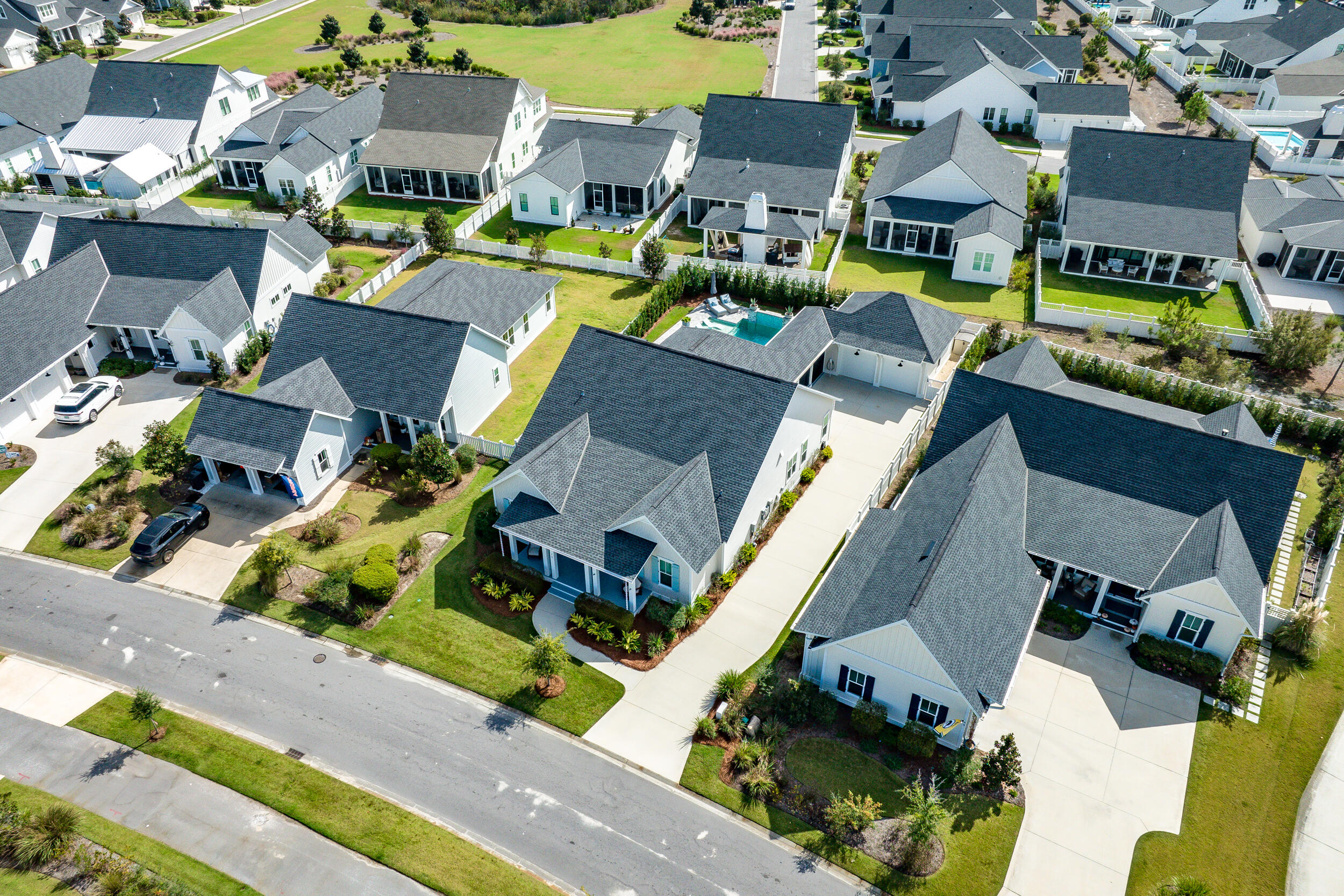 70 Sidecamp Road, Unit LOT 92 Watersound, FL 32461 - Photo 57 of 58 an aerial view of residential houses with outdoor space
