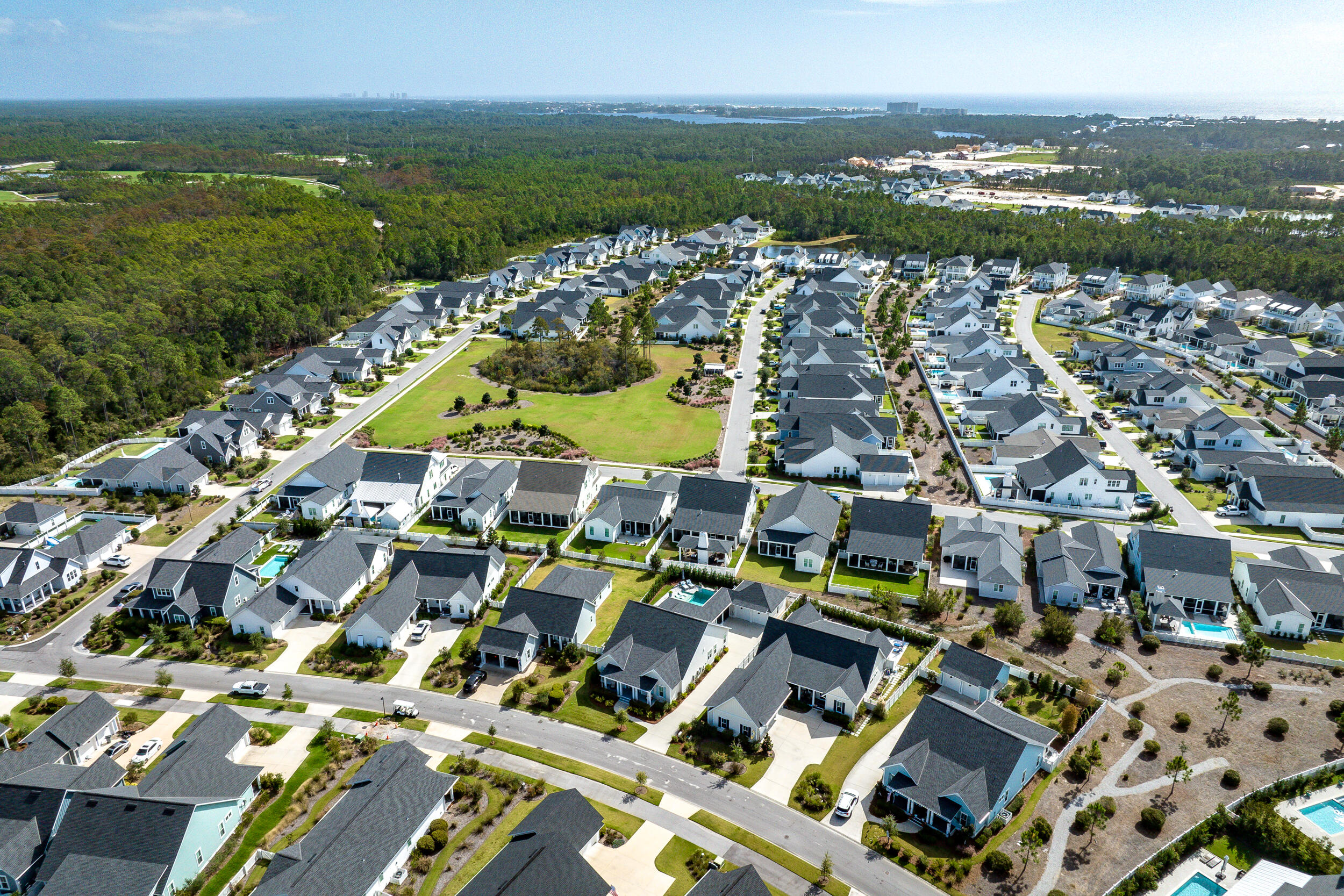 70 Sidecamp Road, Unit LOT 92 Watersound, FL 32461 - Photo 58 of 58 an aerial view of residential building and lake