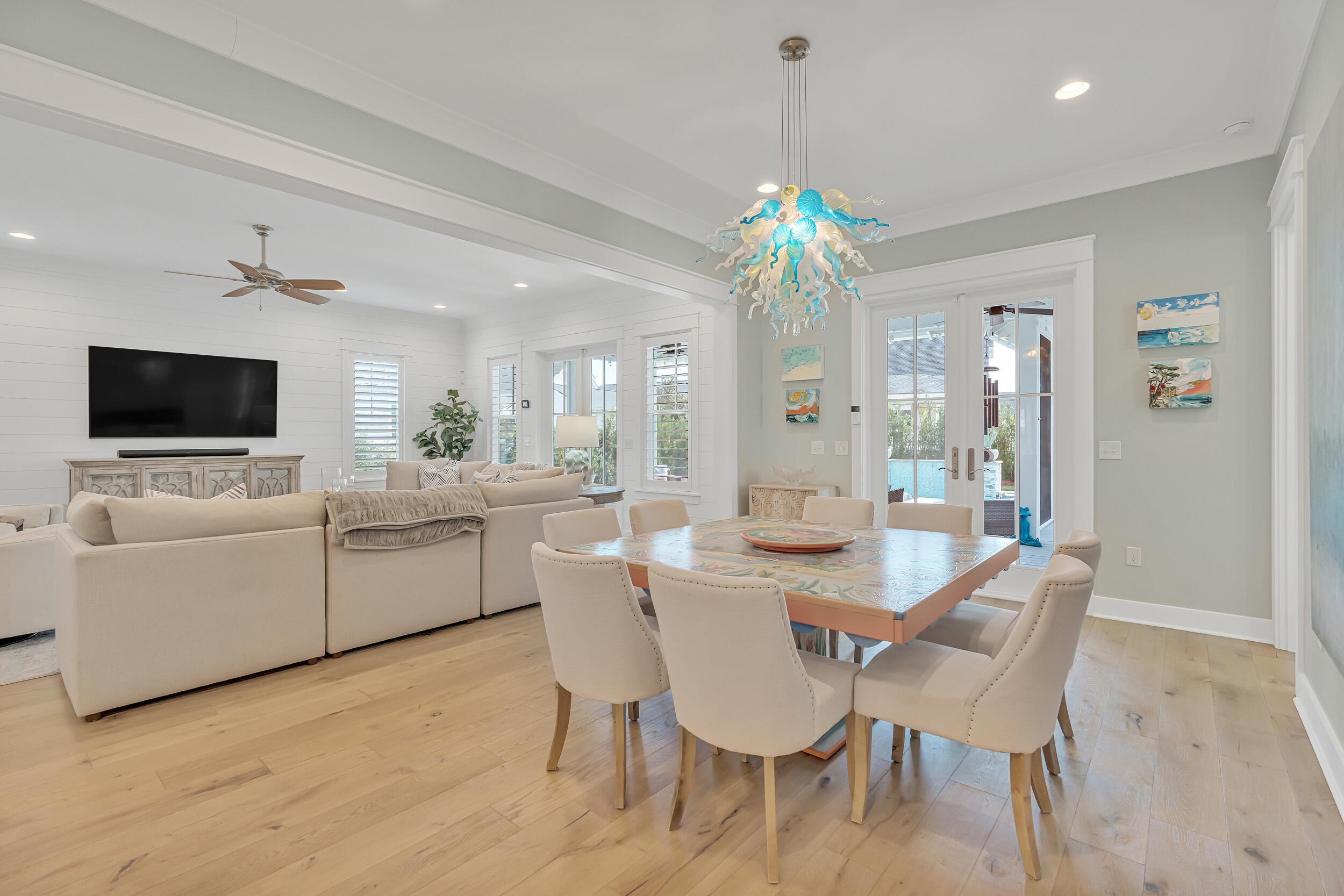 70 Sidecamp Road, Unit LOT 92 Watersound, FL 32461 - Photo 9 of 58 a view of a dining room with furniture and chandelier