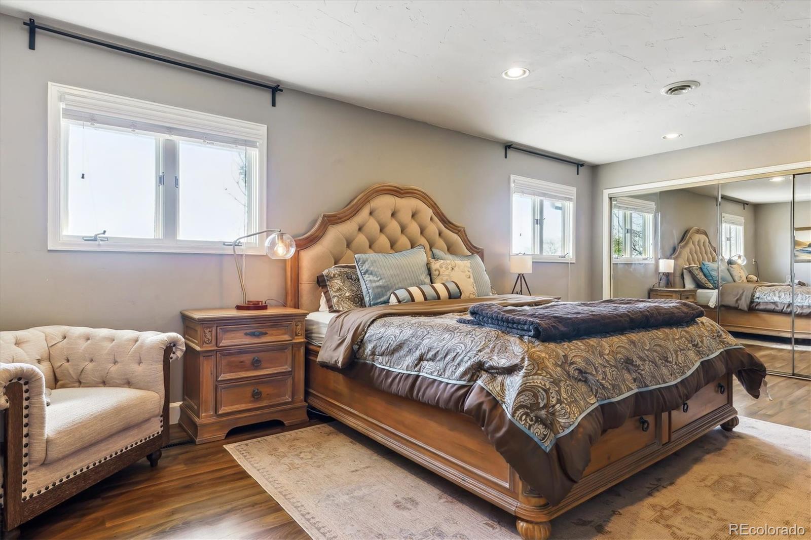 36901 View Ridge Drive Elizabeth, CO 80107 - Photo 12 of 31 a bedroom with a bed couch and a window