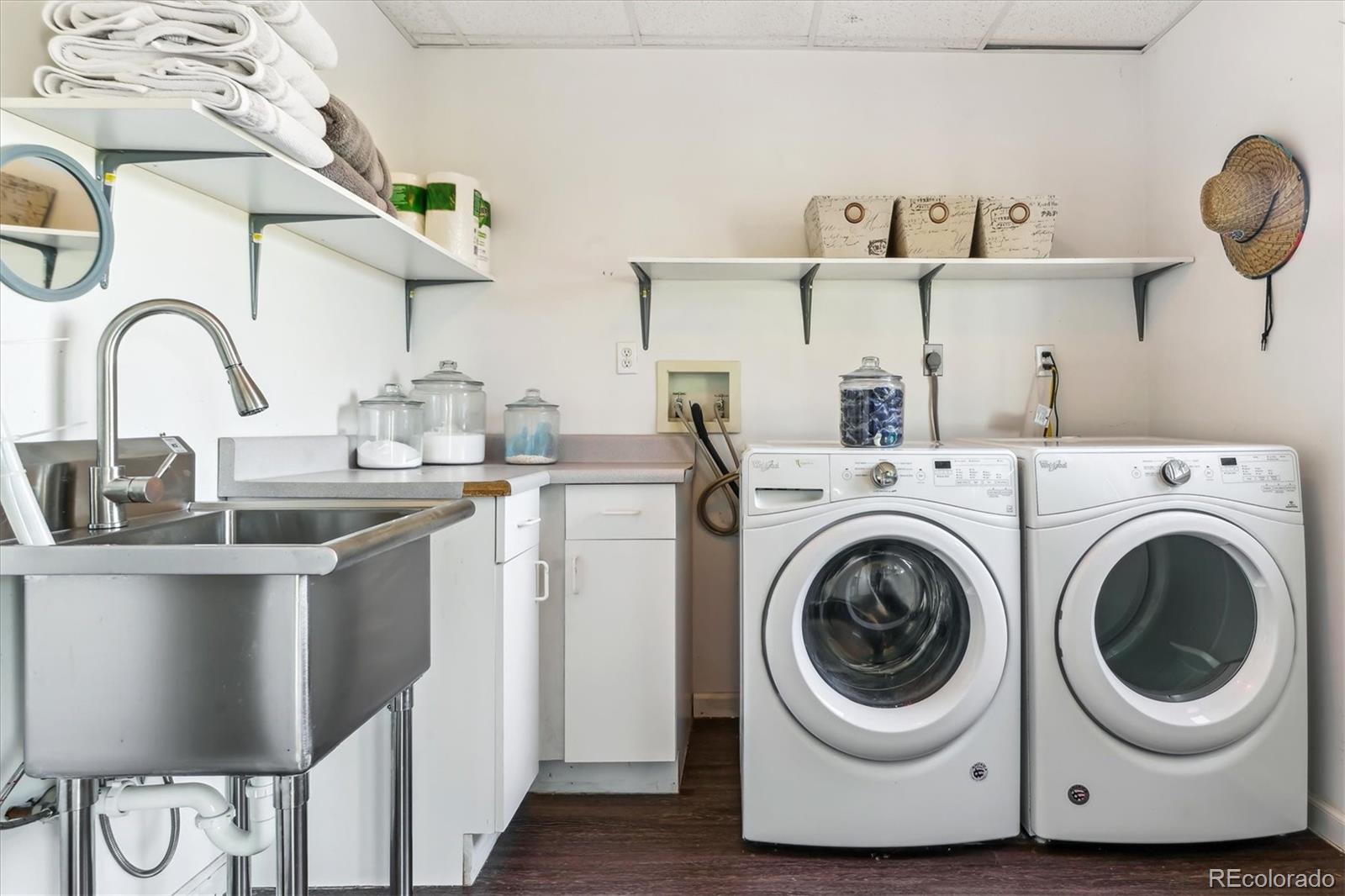 36901 View Ridge Drive Elizabeth, CO 80107 - Photo 20 of 31 a utility room with sink dryer and washer