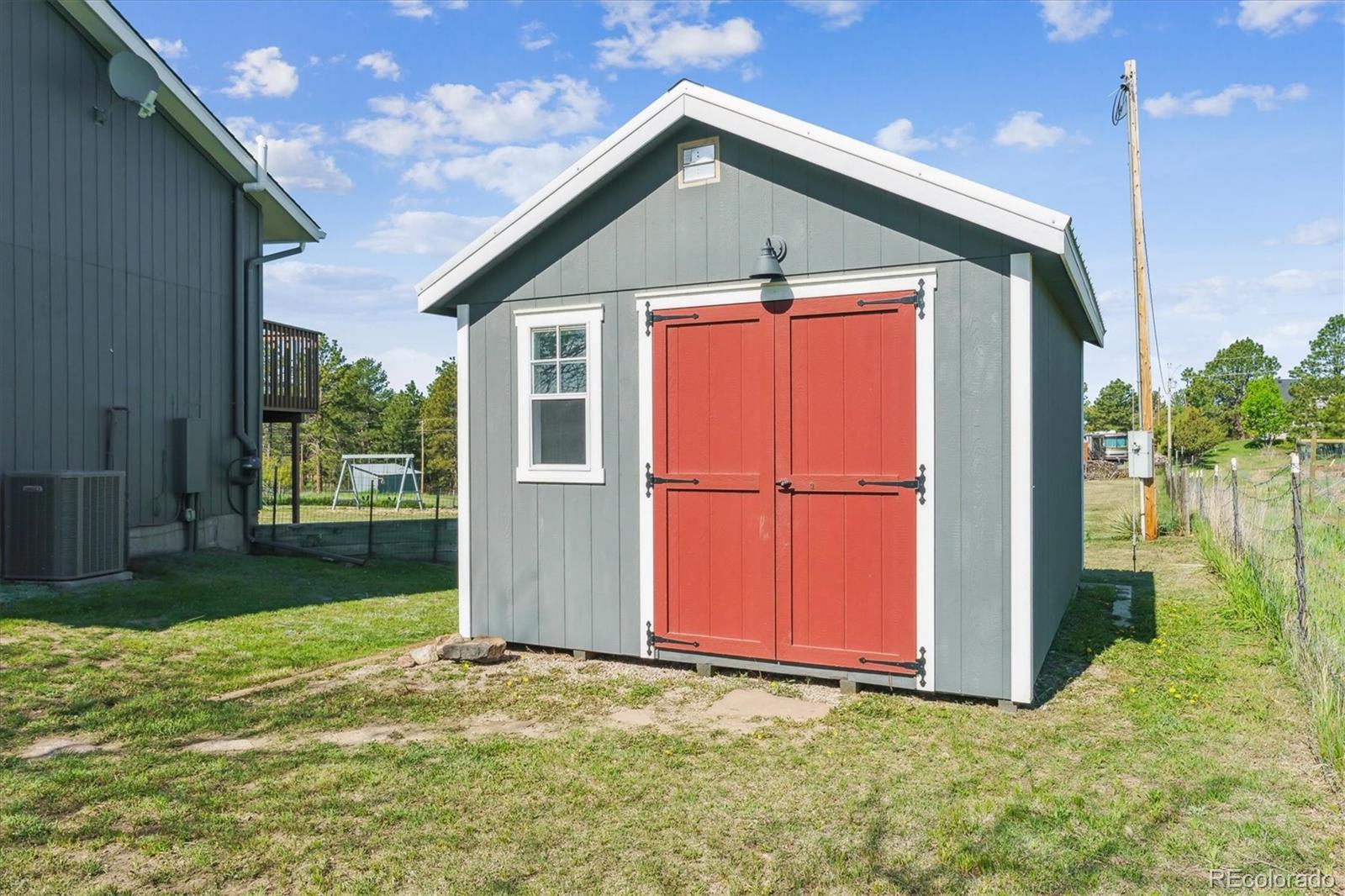 36901 View Ridge Drive Elizabeth, CO 80107 - Photo 21 of 31 a front view of a house with garden