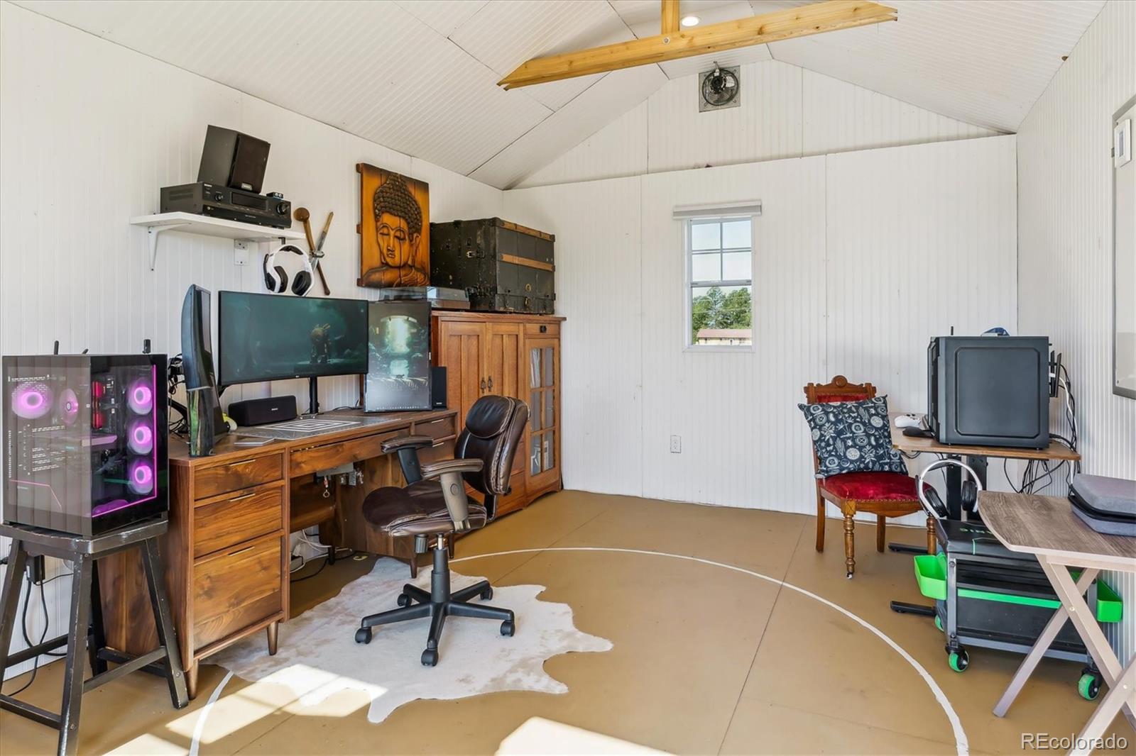 36901 View Ridge Drive Elizabeth, CO 80107 - Photo 22 of 31 a room with furniture and gym equipment