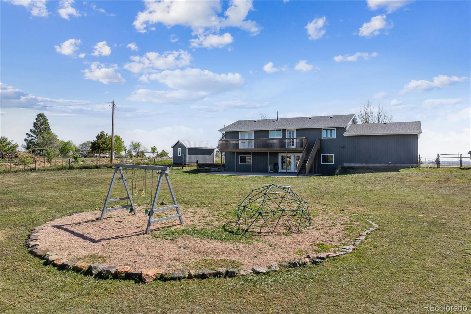 36901 View Ridge Drive Elizabeth, CO 80107 - Photo 25 of 31 a view of a house with a yard