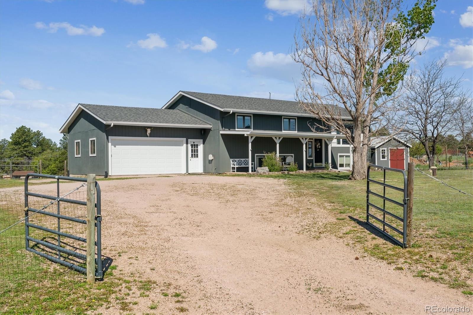36901 View Ridge Drive Elizabeth, CO 80107 - Photo 27 of 31 a front view of a house with a yard