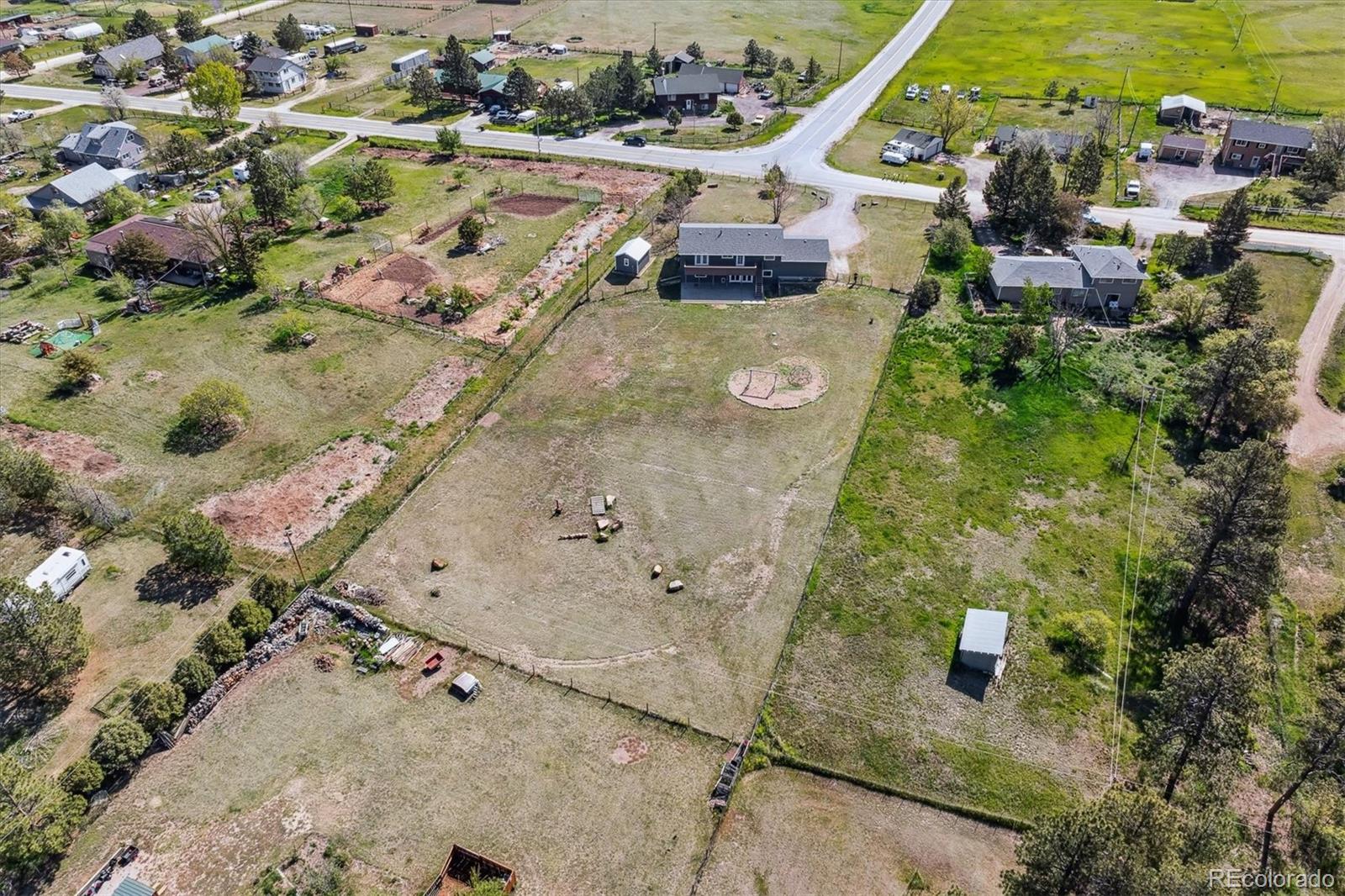 36901 View Ridge Drive Elizabeth, CO 80107 - Photo 30 of 31 an aerial view of a house with a yard