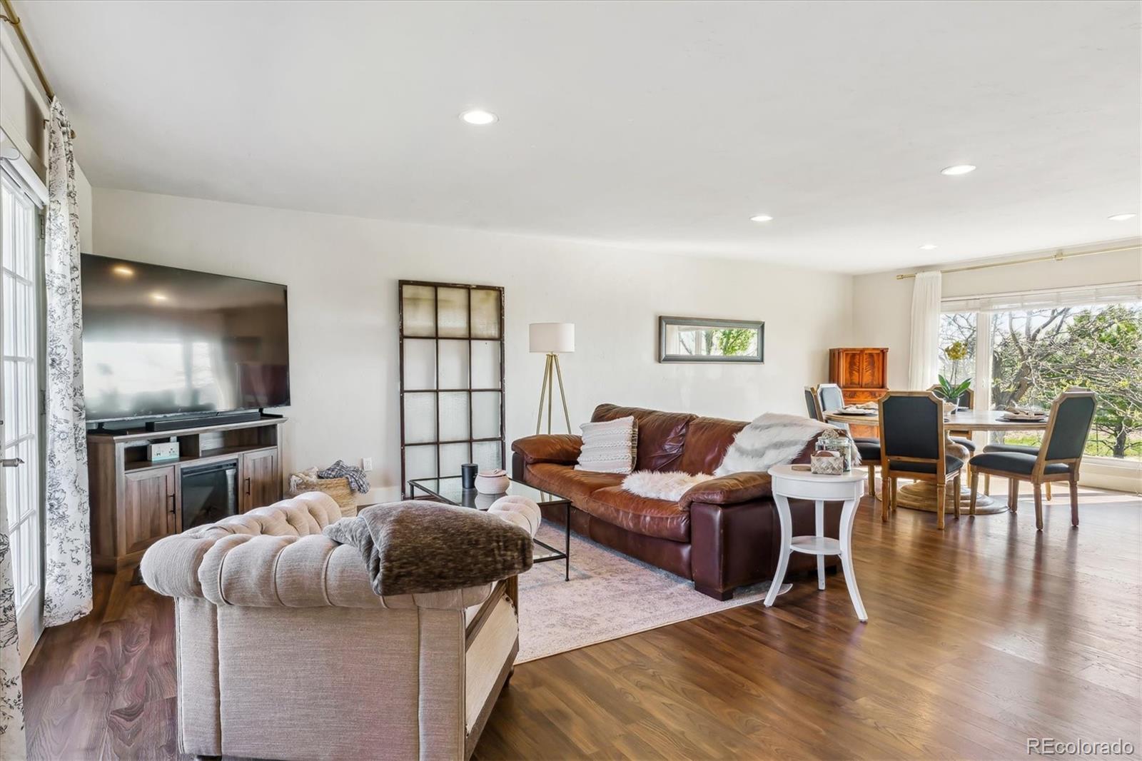 36901 View Ridge Drive Elizabeth, CO 80107 - Photo 3 of 31 a living room with furniture flat screen tv and couches