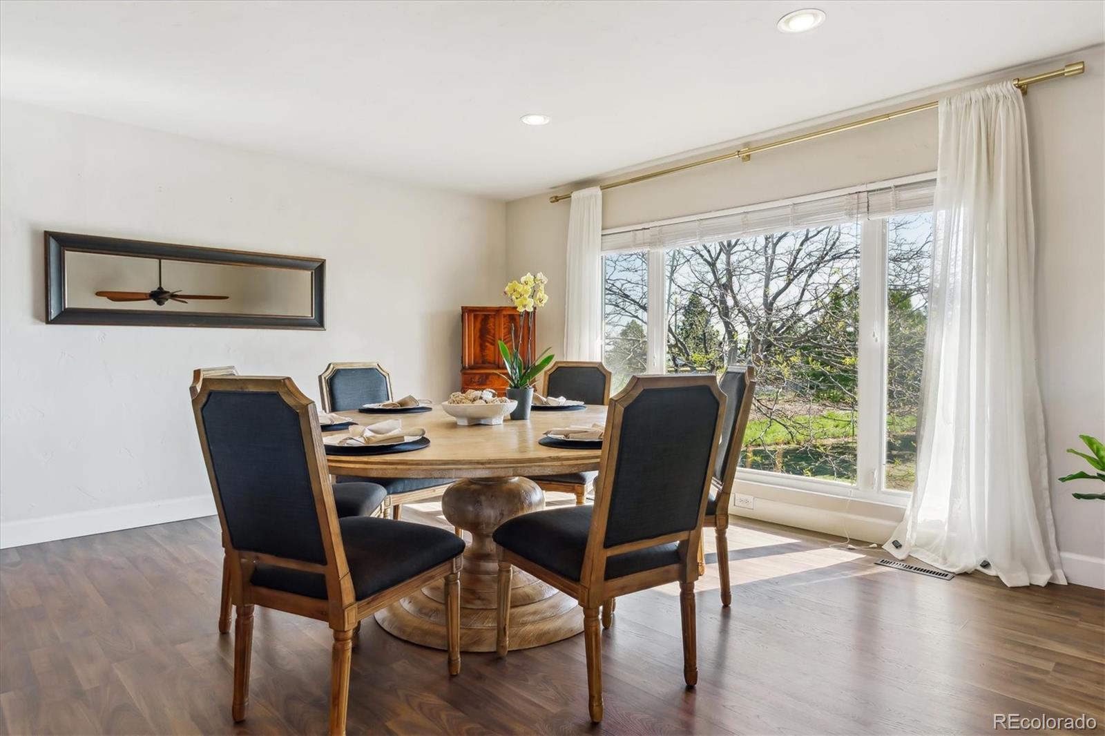 36901 View Ridge Drive Elizabeth, CO 80107 - Photo 9 of 31 a dining room with furniture window wooden floor