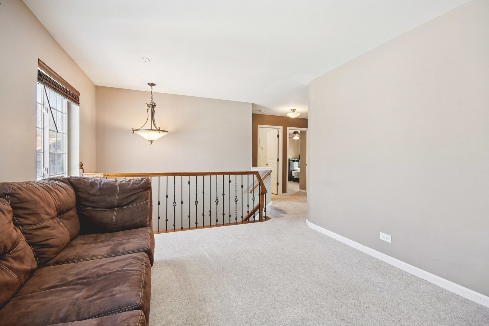521 Ivory Lane Bartlett, IL 60103 - Photo 12 of 28 a living room with furniture and a window