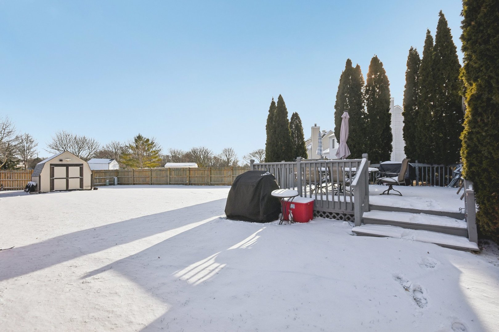 521 Ivory Lane Bartlett, IL 60103 - Photo 23 of 28 a roof deck view with tall buildings