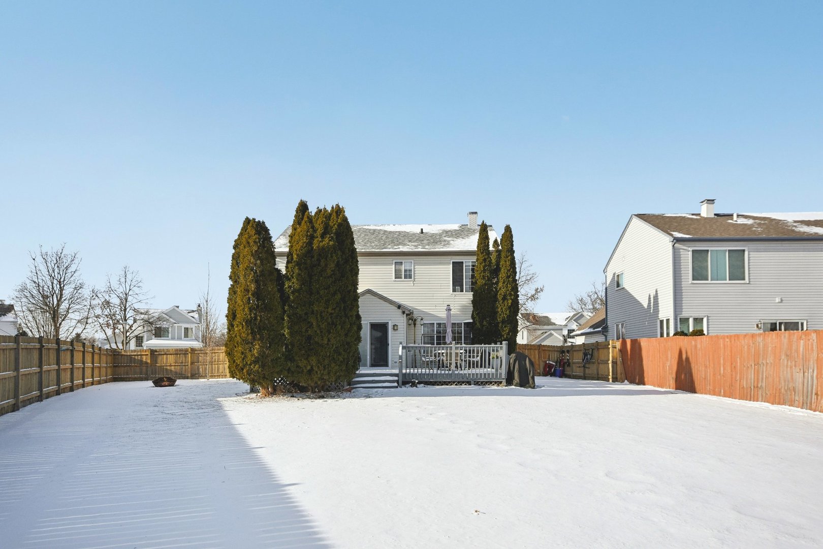 521 Ivory Lane Bartlett, IL 60103 - Photo 24 of 28 a view of a house with a snow on the road