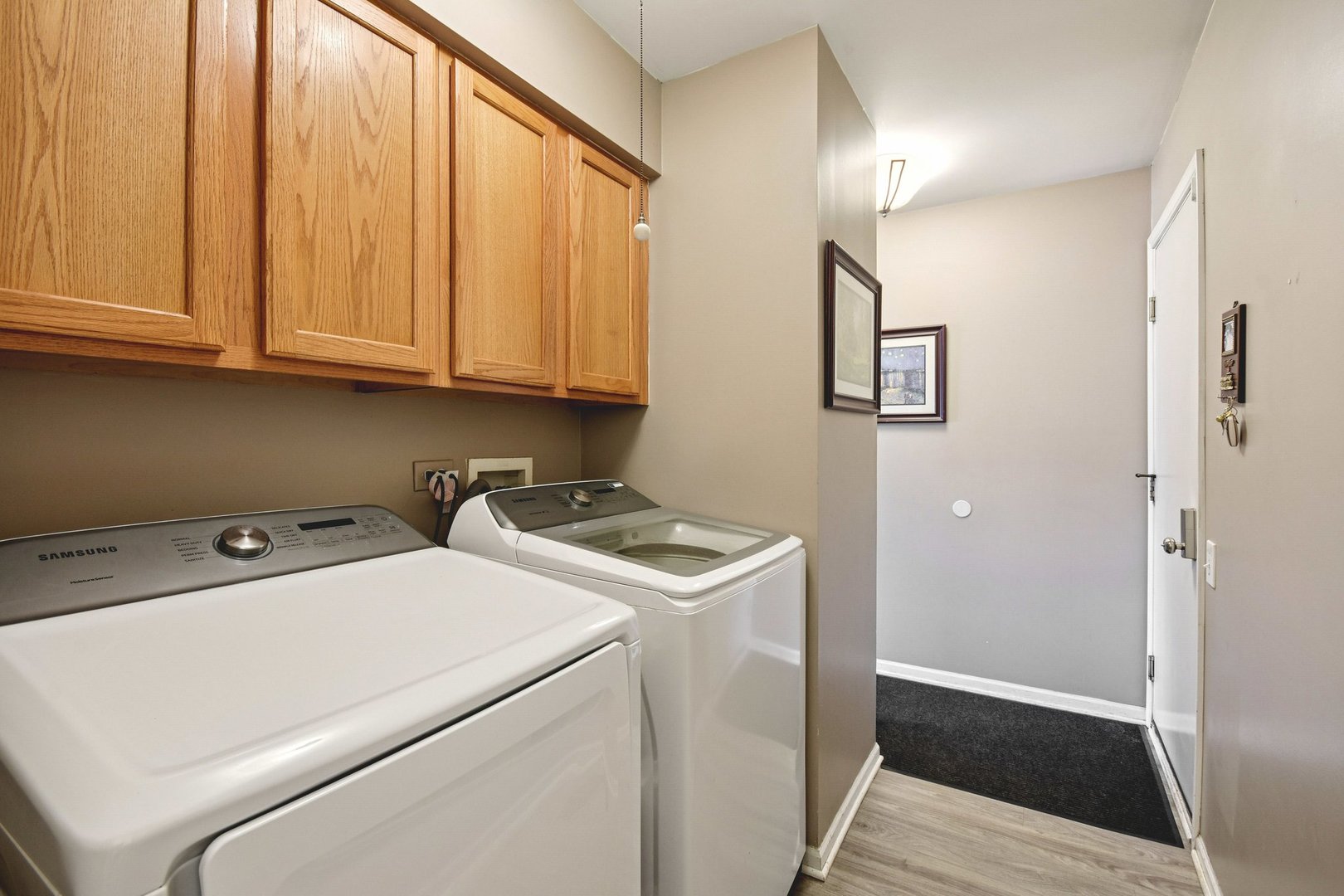 521 Ivory Lane Bartlett, IL 60103 - Photo 9 of 28 a room with dryer and washer