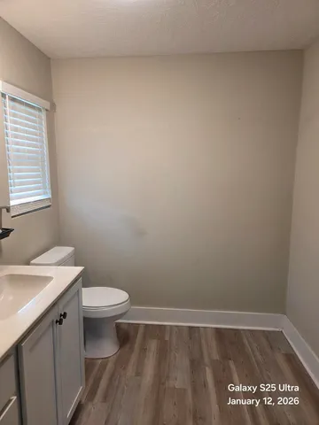 a bathroom with a sink and a toilet