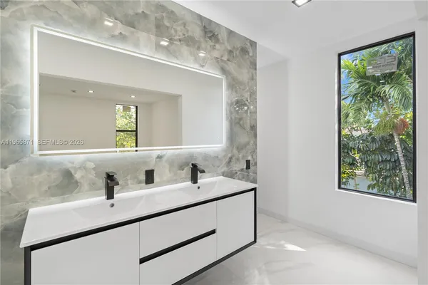 a view of a back yard of the house