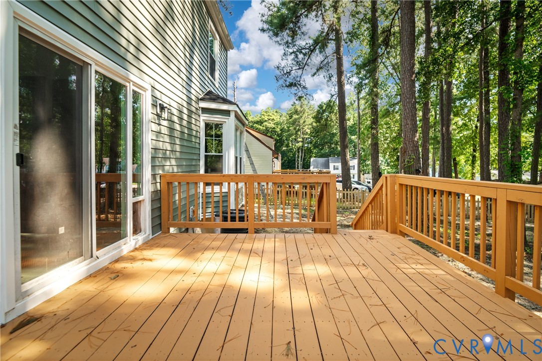 8928 Hawkbill Road North Chesterfield, VA 23237 - Photo 45 of 50 Expansive outdoor deck with natural wood railing a