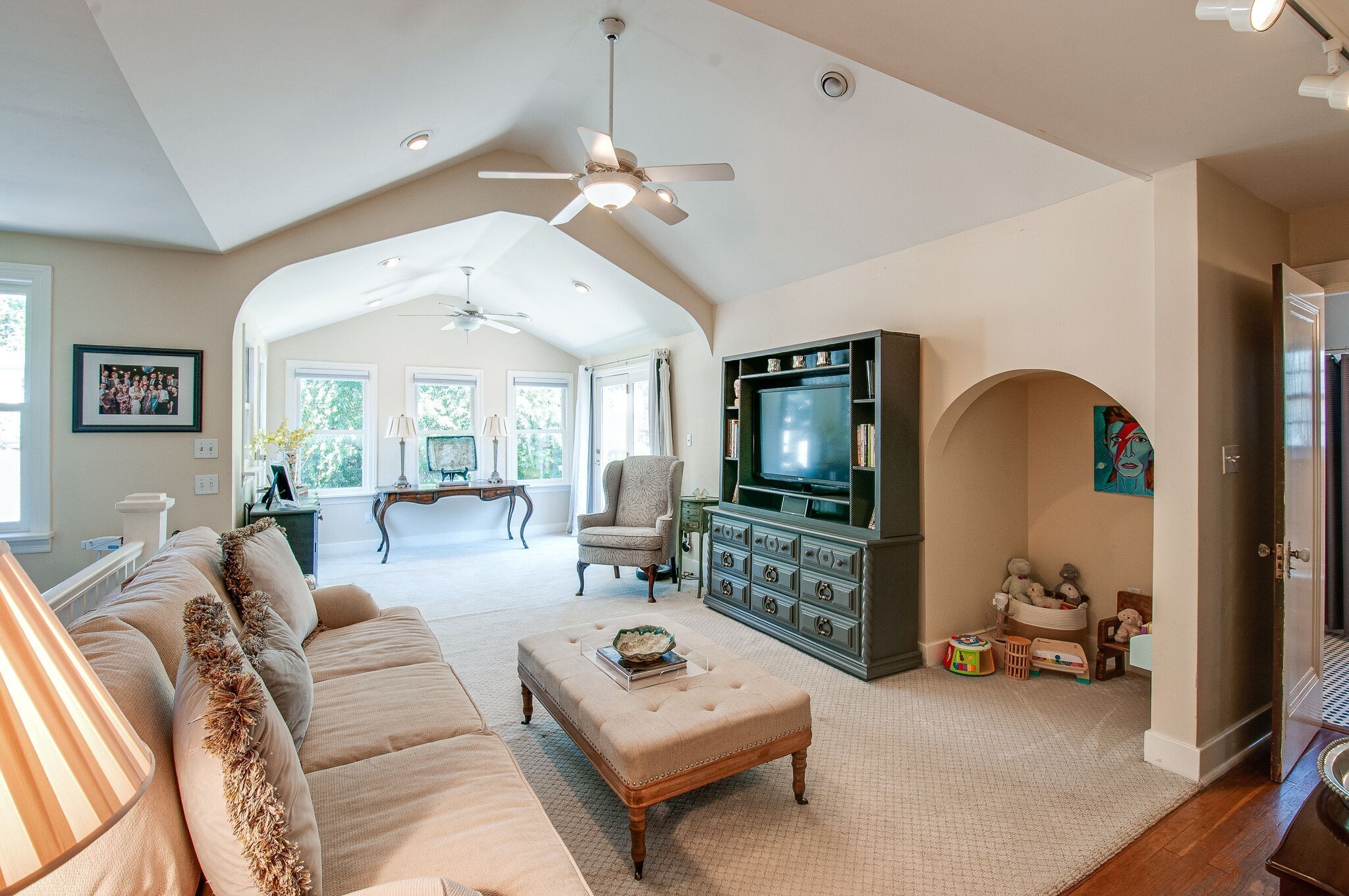 216 Cherokee Road Nashville, TN 37205 - Photo 24 of 39 a living room with furniture and a flat screen tv