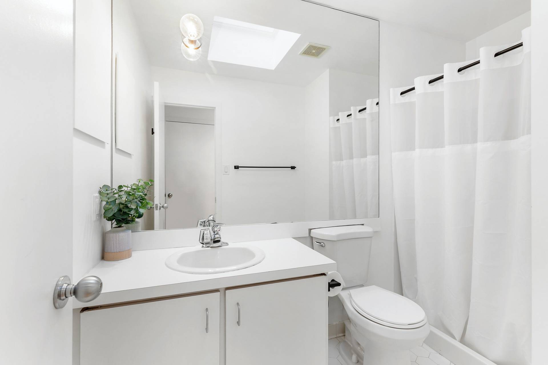 34 North Quarter Road Westhampton, NY 11977 - Photo 9 of 15 a bathroom with a sink toilet and shower