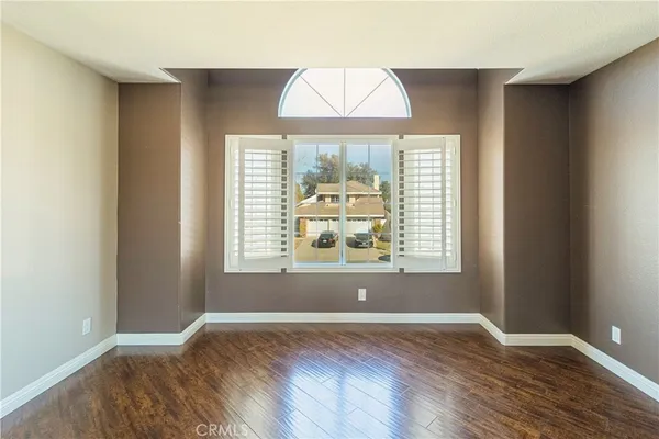 a workspace with furniture and a window