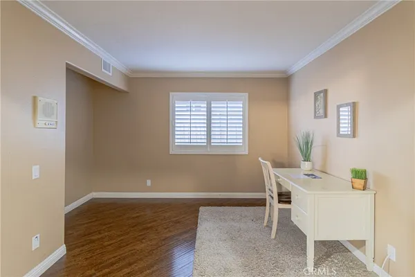 a view of small space with wooden floor