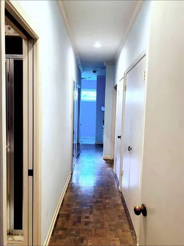 a view of a house with backyard porch and sitting area