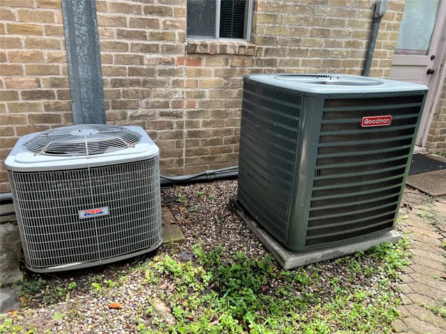 a view of a house with a tree