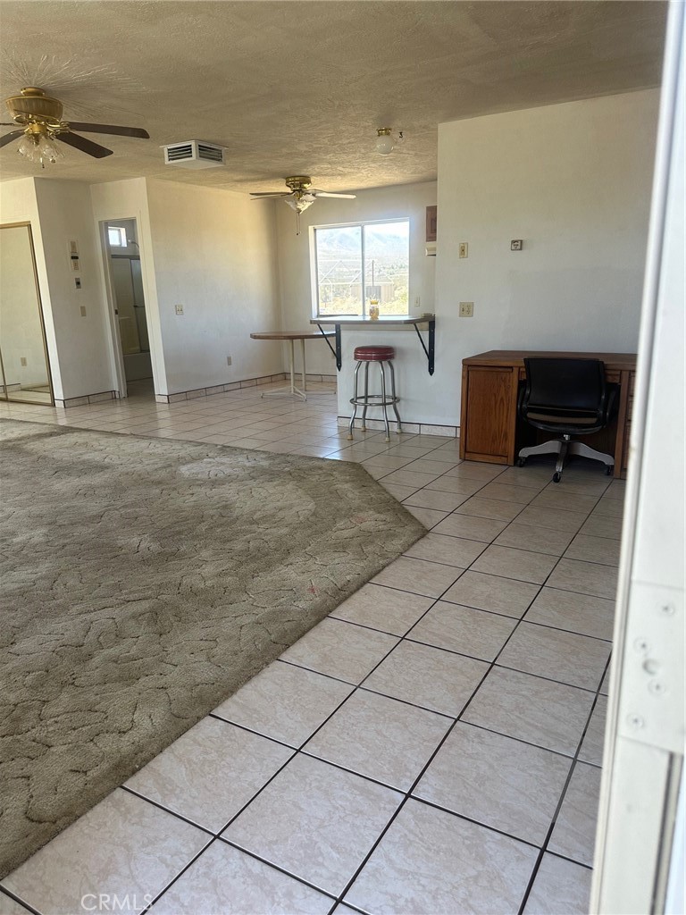 9772 Alamo Road Lucerne Valley, CA 92356 - Photo 23 of 24 a view of kitchen with furniture and window