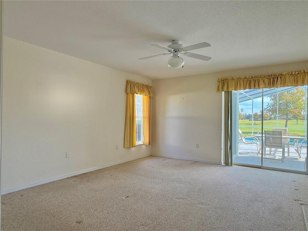 5614 Angelo Circle Sebring, FL 33872 - Photo 21 of 39 an empty room with windows