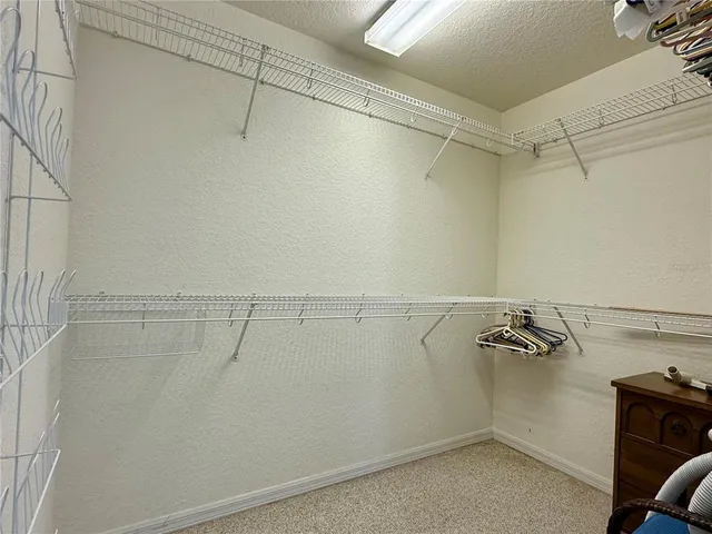 a view of a room with racks on the wall