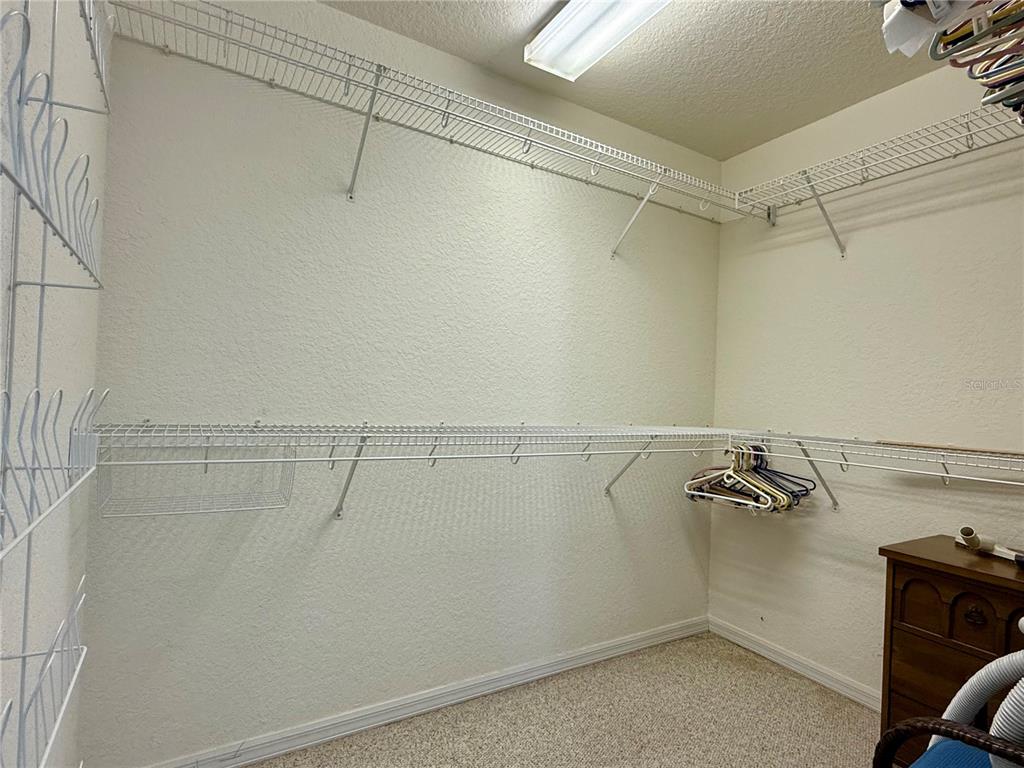 5614 Angelo Circle Sebring, FL 33872 - Photo 22 of 39 a view of a room with racks on the wall