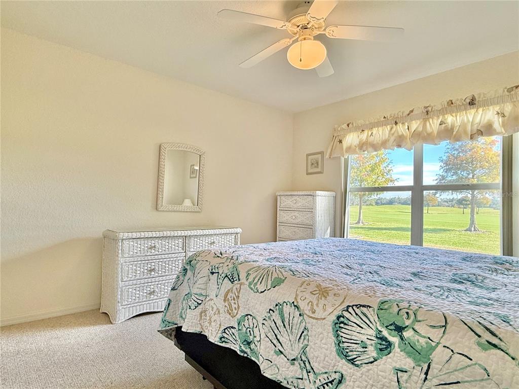 5614 Angelo Circle Sebring, FL 33872 - Photo 28 of 39 a bedroom with a bed and a large window