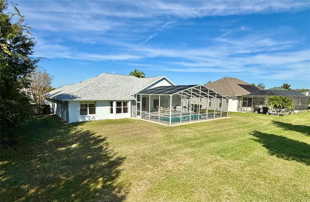 5614 Angelo Circle Sebring, FL 33872 - Photo 3 of 39 a front view of a house with a garden