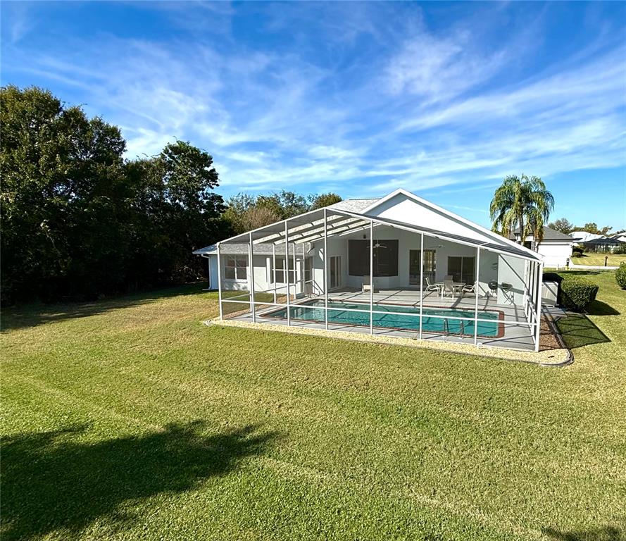 5614 Angelo Circle Sebring, FL 33872 - Photo 37 of 39 a house with swimming pool in front of it