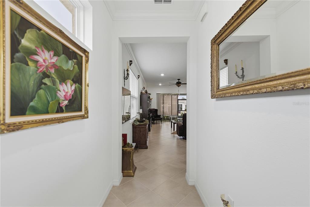 9680 Southwest 103rd Terrace Ocala, FL 34481 - Photo 4 of 24 a view of a hallway with workspace