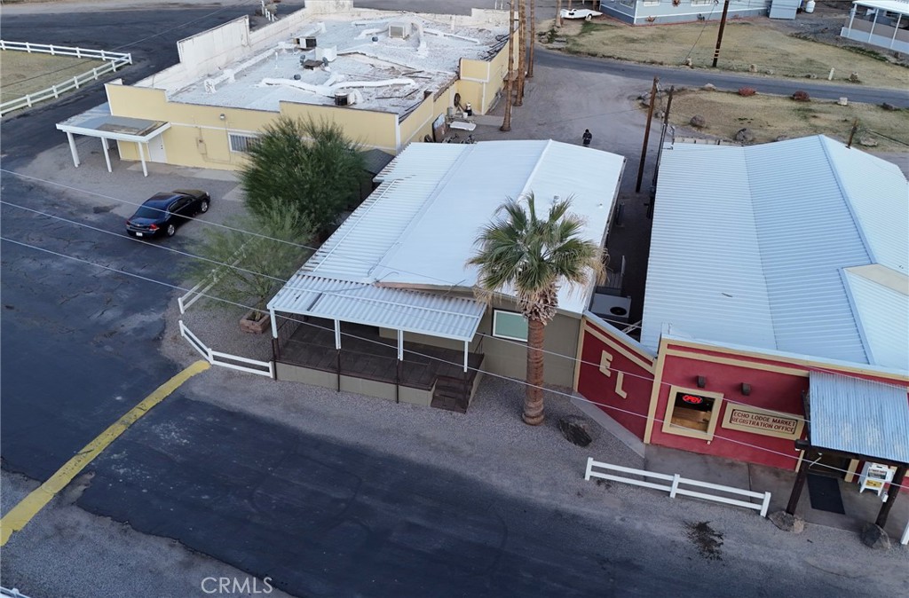 451 Parker Dam Road, Unit B1 Parker Dam, CA 92267 - Photo 23 of 36 an outdoor sitting area with furniture and wooden floor