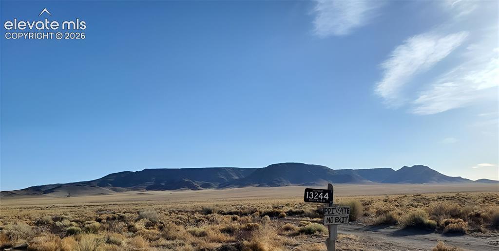21 County Road Manassa, CO 81141 - Photo 13 of 14 a view of mountain with sunset in background