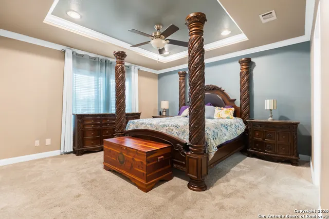 a bedroom with bed and a dresser
