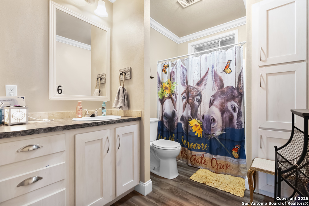 201 Private Road 1524 Bandera, TX 78003 - Photo 24 of 36 a bathroom with a sink toilet and shower