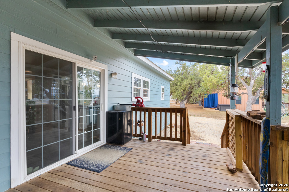 201 Private Road 1524 Bandera, TX 78003 - Photo 26 of 36 a view of a balcony with wooden floor