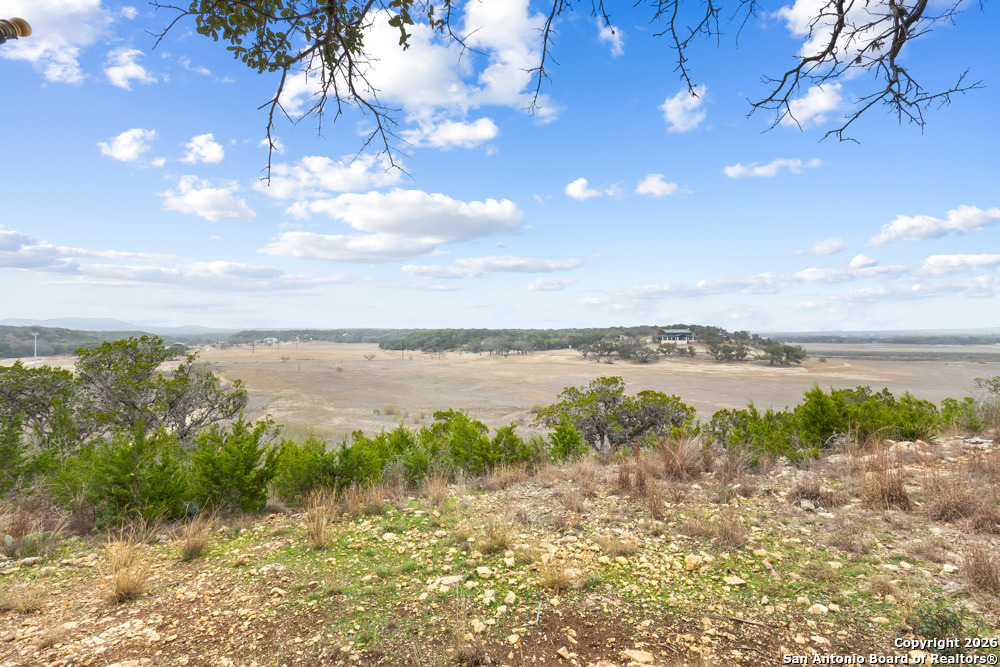 201 Private Road 1524 Bandera, TX 78003 - Photo 30 of 36 a view of a lake from a yard