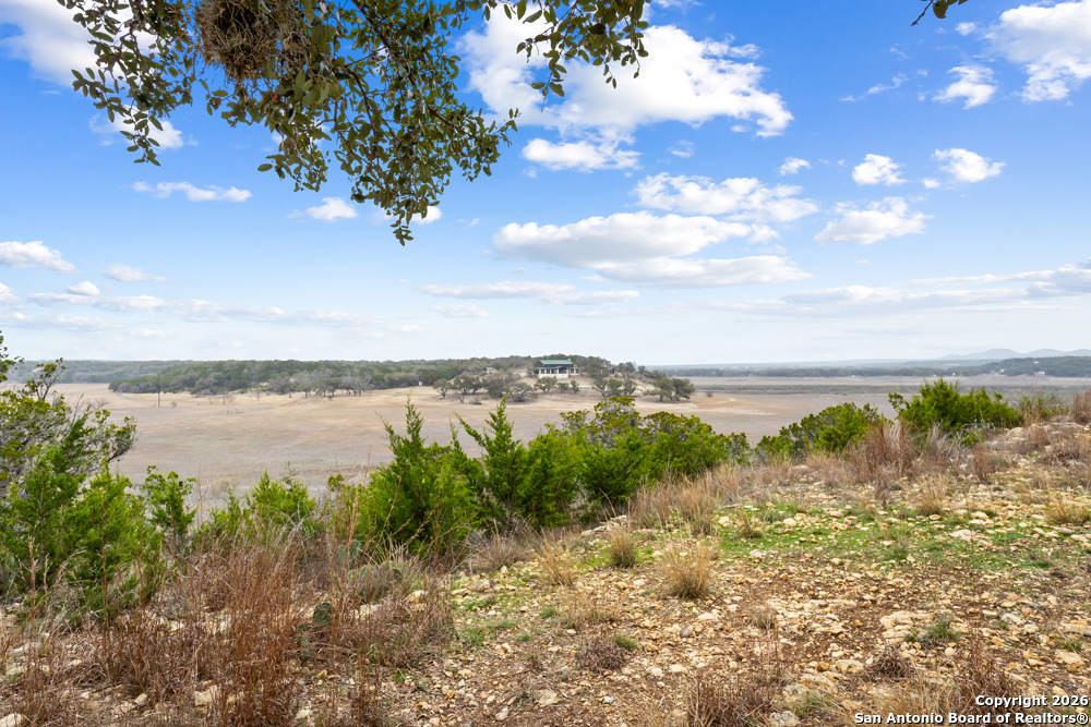 201 Private Road 1524 Bandera, TX 78003 - Photo 31 of 36 a view of a lake from a yard