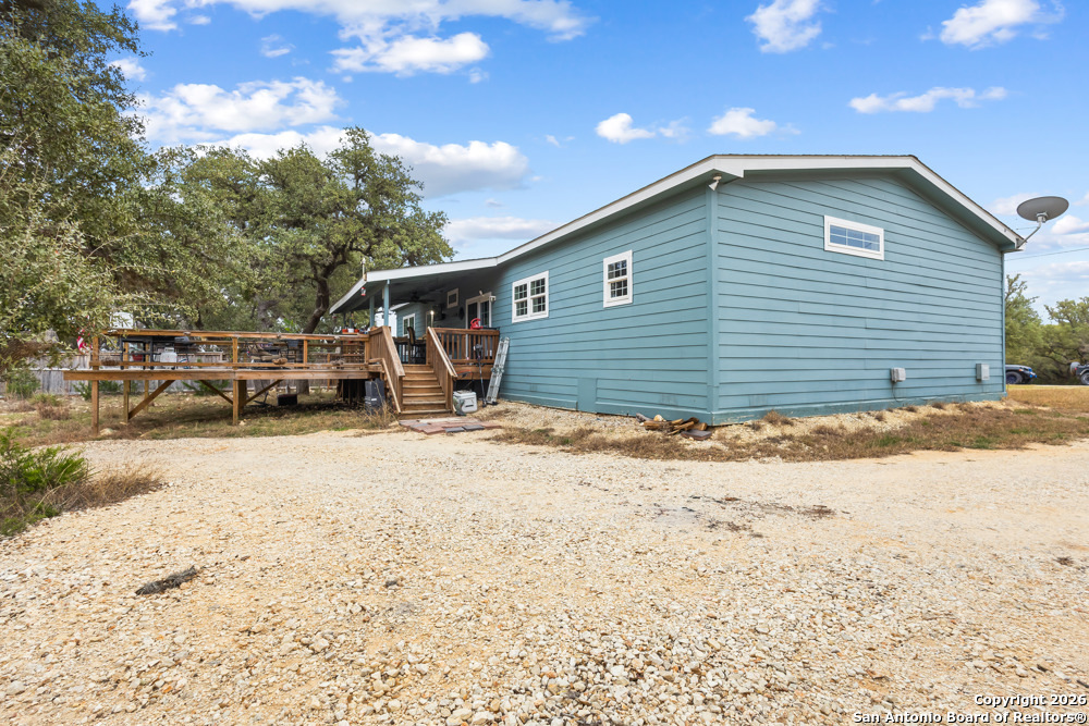 201 Private Road 1524 Bandera, TX 78003 - Photo 32 of 36 a view of a house with wooden fence