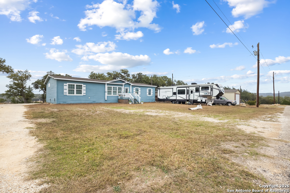 201 Private Road 1524 Bandera, TX 78003 - Photo 34 of 36 a view of houses with outdoor space