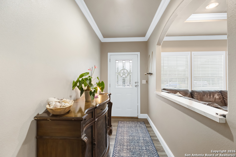 201 Private Road 1524 Bandera, TX 78003 - Photo 5 of 36 a living room with furniture and a potted plant