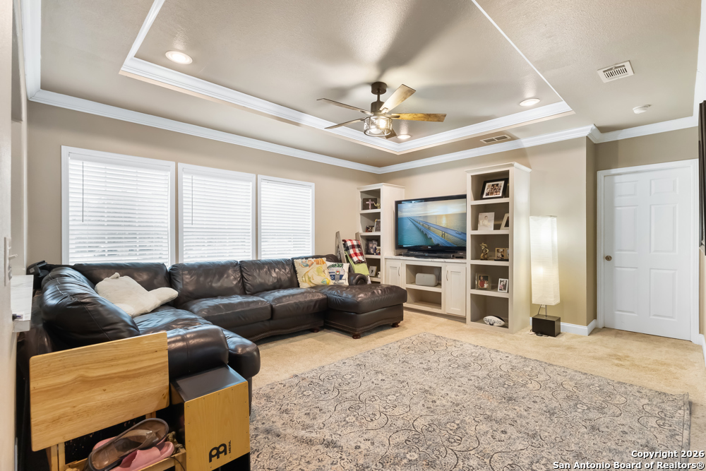 201 Private Road 1524 Bandera, TX 78003 - Photo 7 of 36 a living room with furniture and a flat screen tv