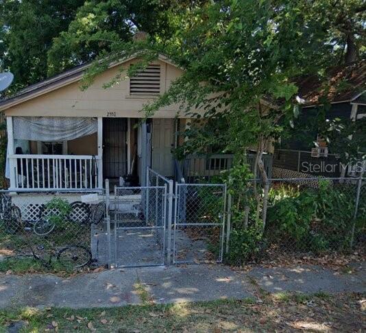 2549 Calvin Street Jacksonville, FL 32204 - Photo 1 of 1 a front view of a house with garden